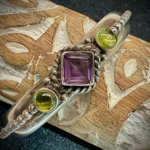 Beautiful sterling silver cuff bracelet with amethyst and peridot.